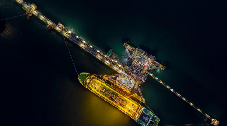 Aerial view of a maritime tanker terminal at night